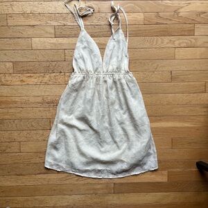 Off White floral mini dress. With tie straps.
